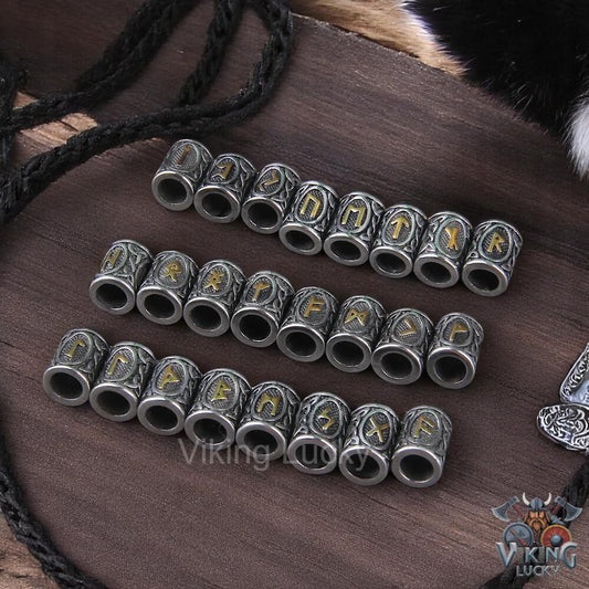 Silver beads with lettering on a wooden surface, featuring the 'Viking Lucky' brand.