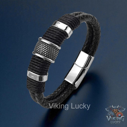 Black braided bracelet with silver accents on a blue background, featuring the 'Viking Lucky' brand.