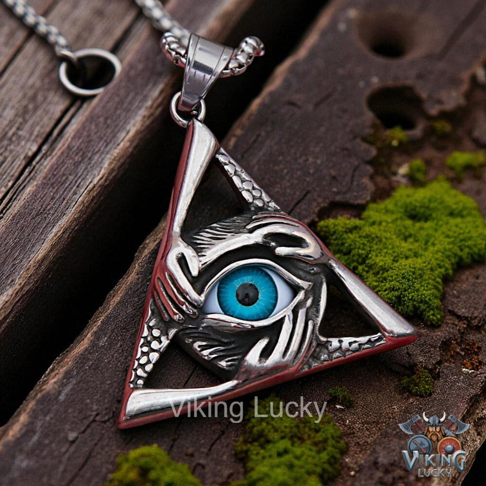 Silver pyramid-shaped pendant with eye design on a wooden surface, featuring 'Viking Lucky' branding.