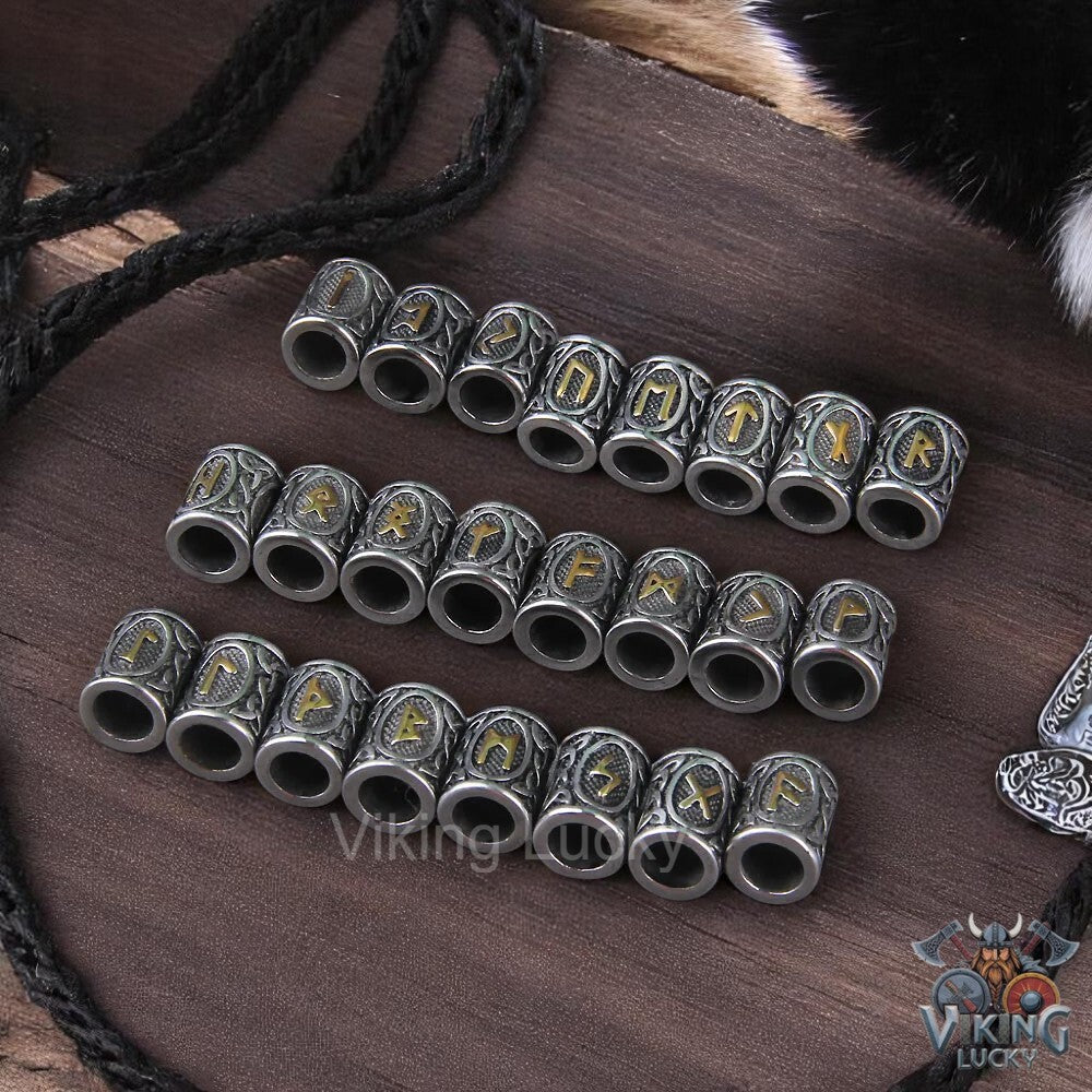 Silver beads with lettering on a wooden surface, featuring the 'Viking Lucky' brand.