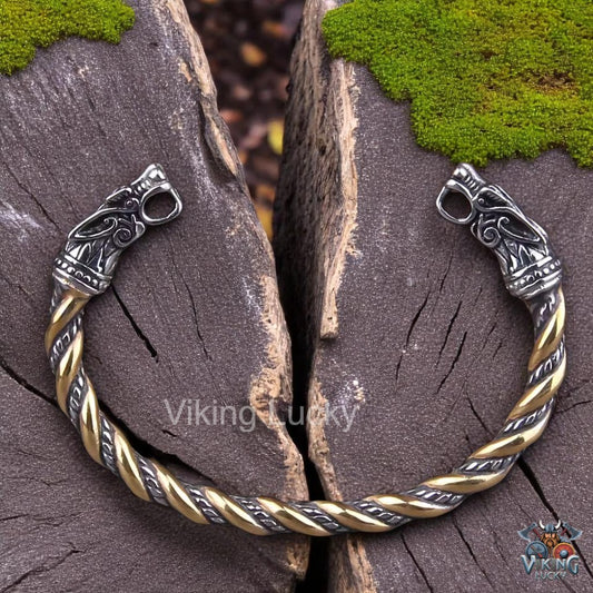 Gold and silver tone Viking bracelet with dragon head design