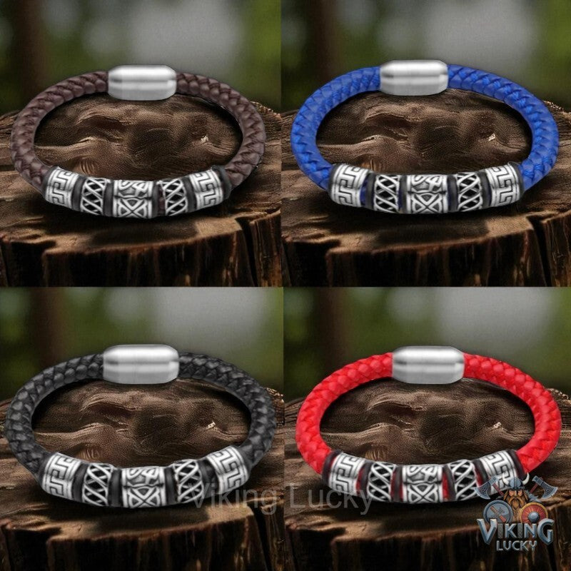 Four different colored braided bracelets on wooden logs with 'Viking Lucky' branding.