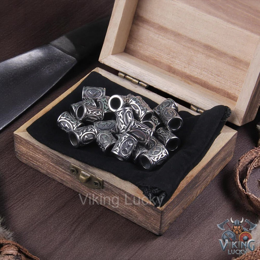 Silver beads in a wooden box with 'Viking Lucky' branding.