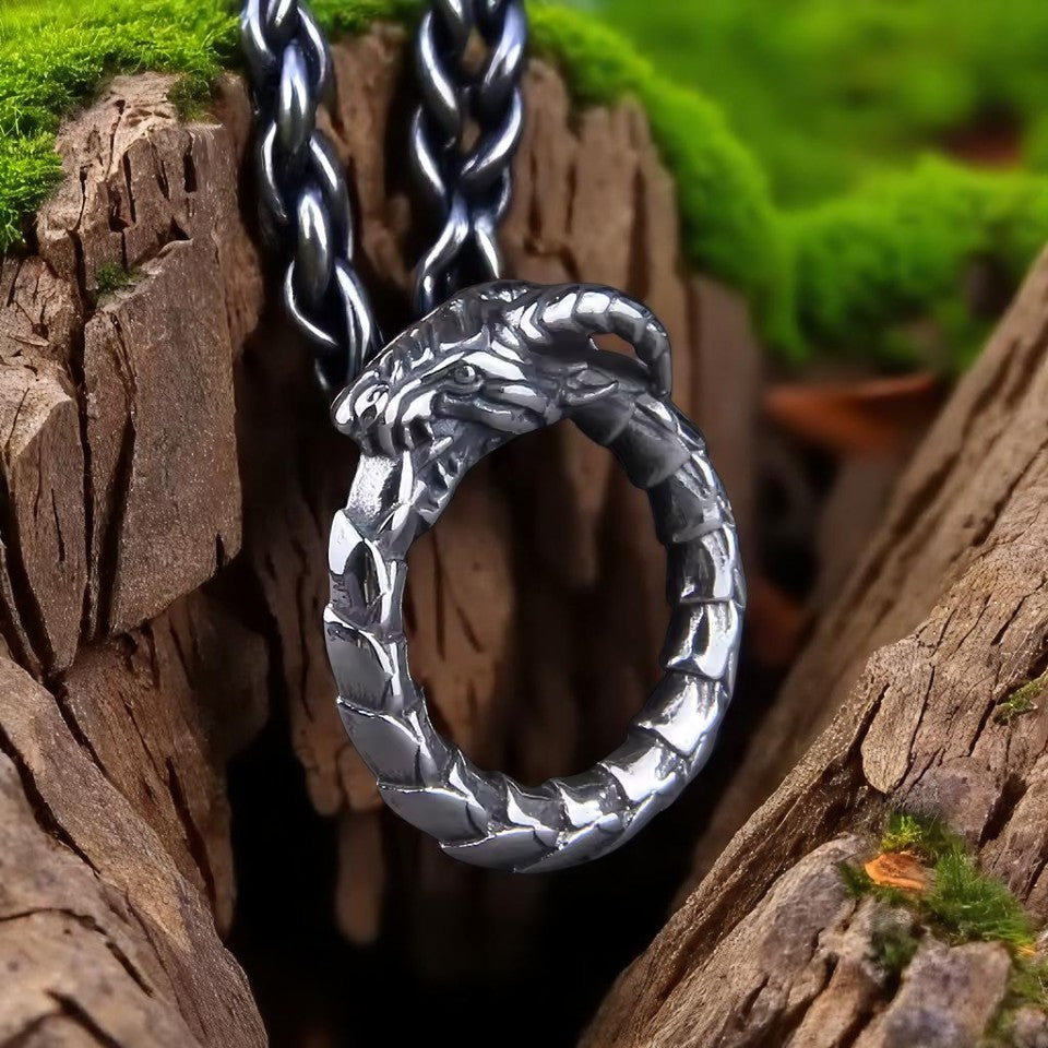 Stainless steel Ouroboros Viking ring featuring a dragon devouring tail closeup shot