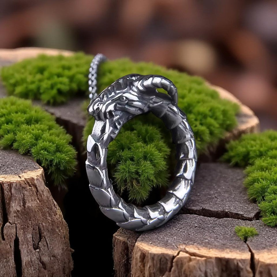 Stainless steel Ouroboros Viking ring featuring a dragon devouring tail side view