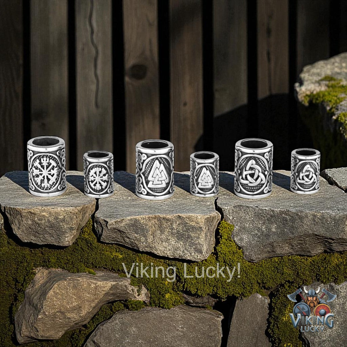 Set of six metallic shot glasses with Celtic designs on a stone surface, branded 'Viking Lucky'.