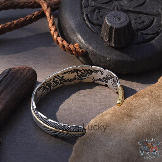 Viking Feather Cuff Bracelet in silver and gold with detailed feather engraving backside view