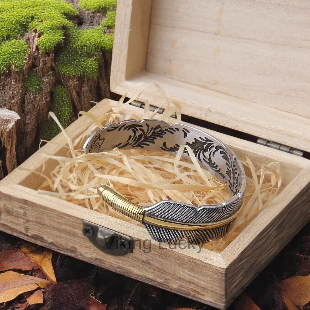 Viking-Feather-Cuff-Bracelet-in-silver-and-gold-with-detailed-feather-engraving-Wooden-Box
