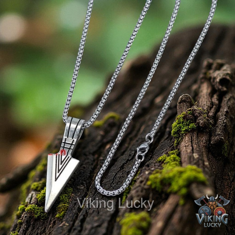 Silver necklace with a triangular pendant on a wooden background, featuring 'Viking Lucky' branding.