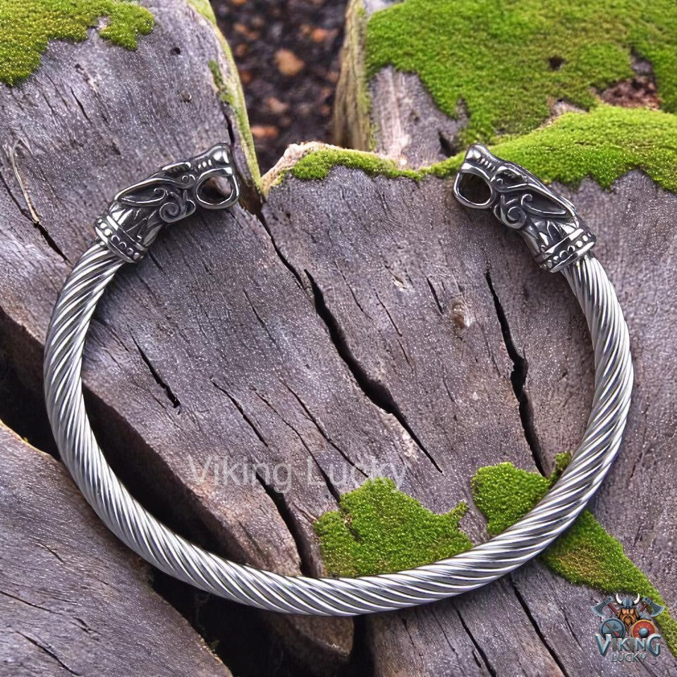 Viking bracelet with twisted band and silver dragon head terminals Closer View