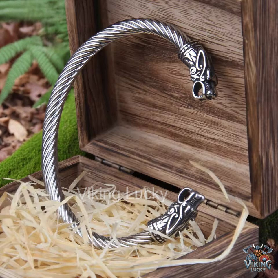 Viking bracelet with twisted band and silver dragon head terminals With Box