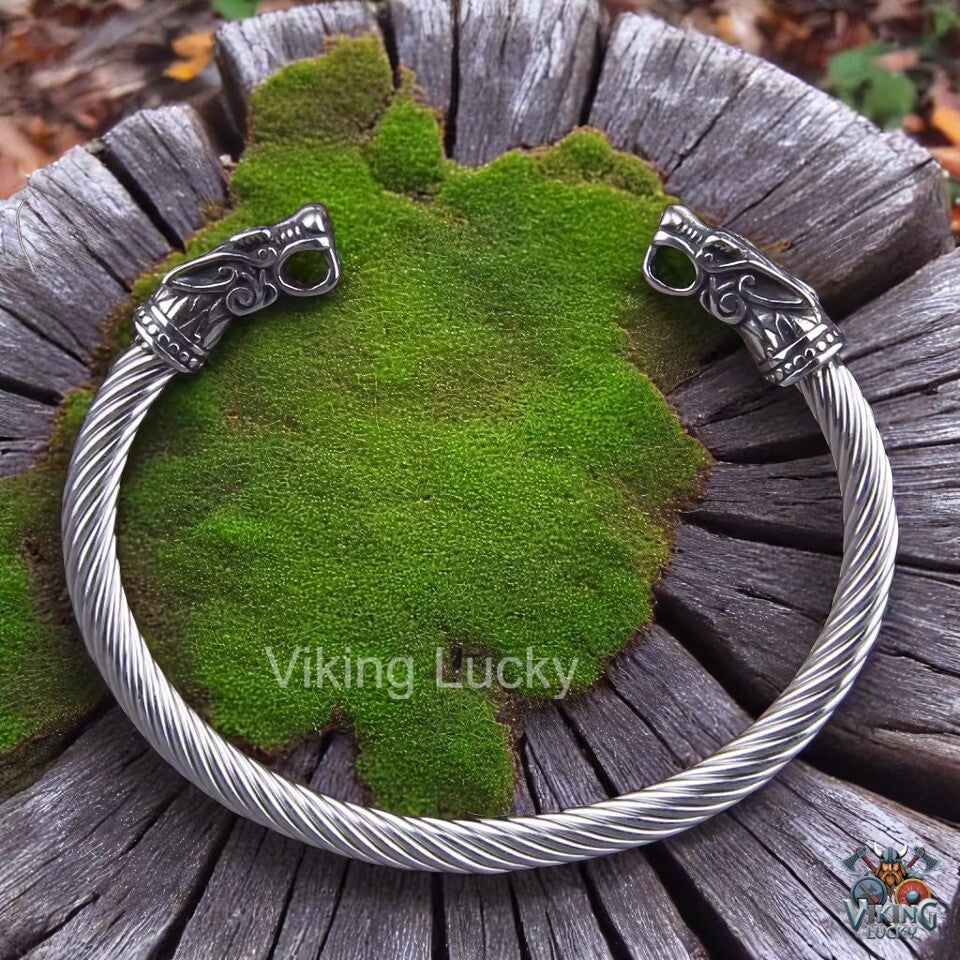 VikingLucky: Viking bracelet with twisted band and silver dragon head terminals
