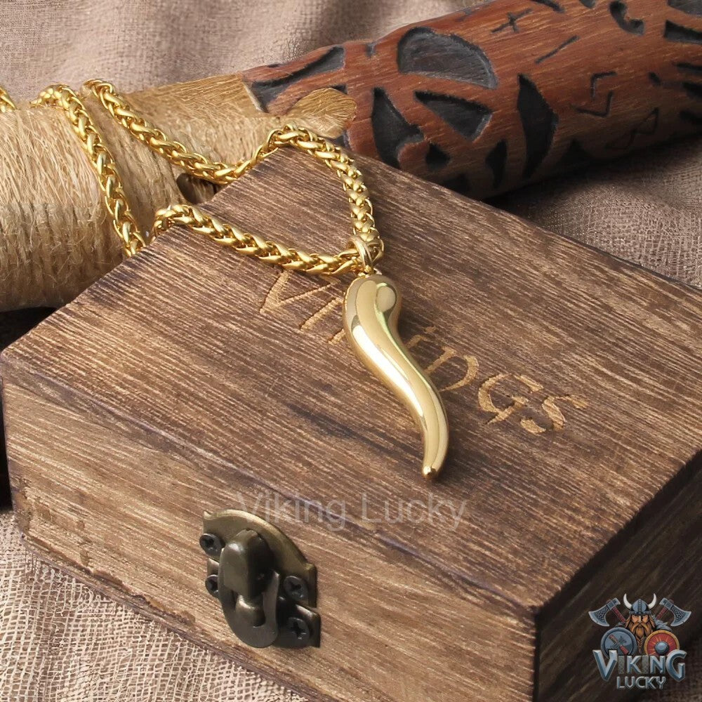 Norse gold-horn pendant necklace lucky viking amulet for women with wooden closeup view